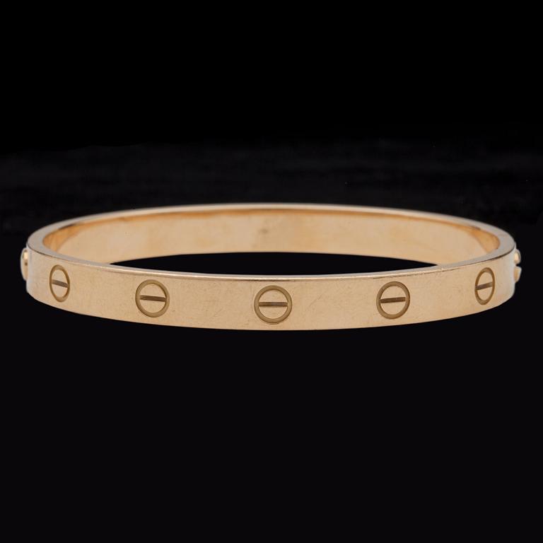 A Cartier gold 'Love bracelet'.
