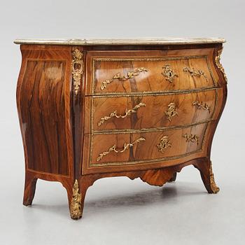 A rococo ormolu-mounted and parquetry commode attributed to C. G. Willkom (master in Stockholm 1763-65).