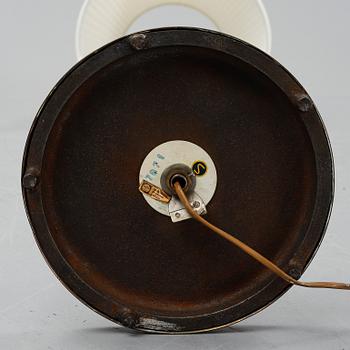 A '7071' floor lamp by Falkenbergs belysning.