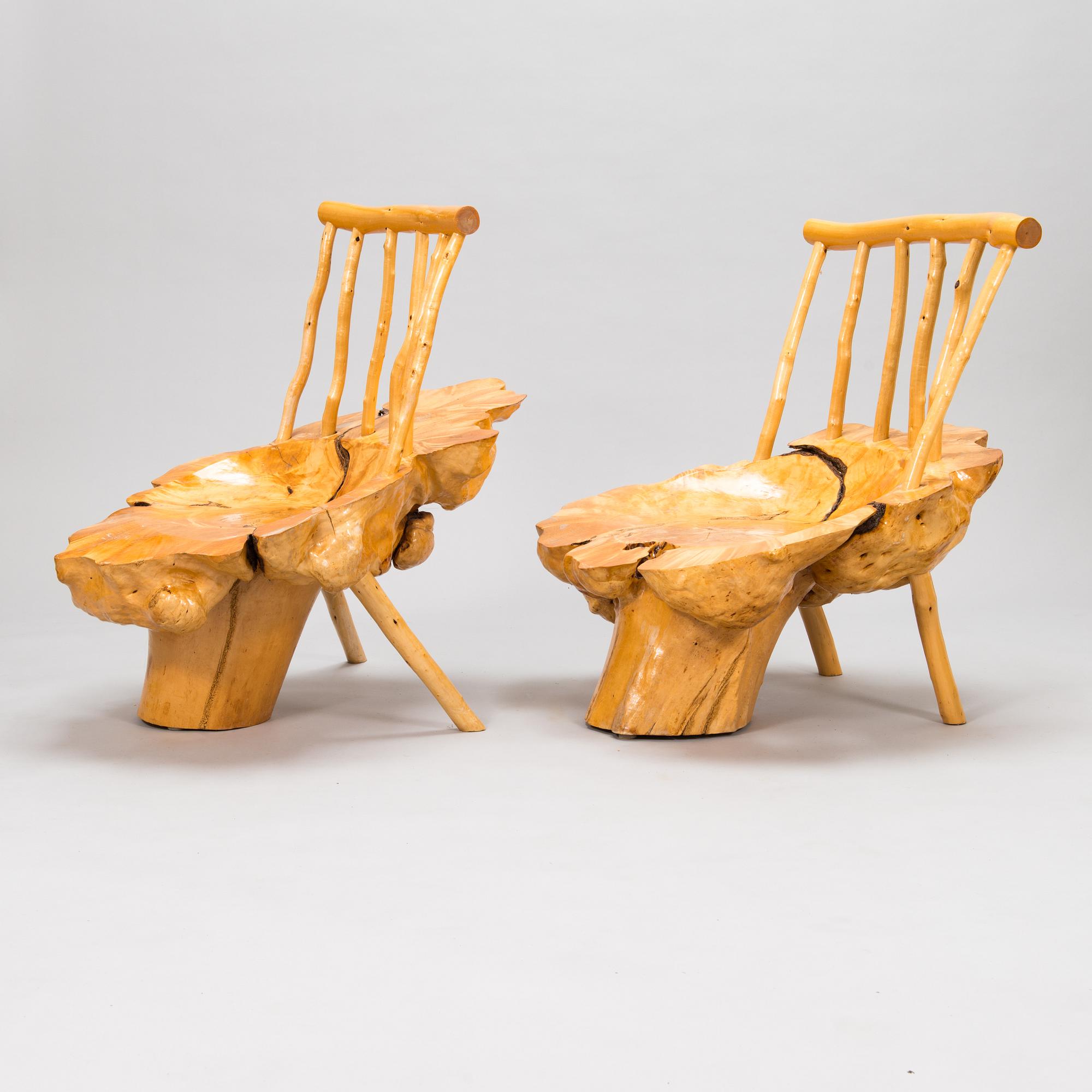 A pair of mid-20th century burr wood easy chairs made by  Johannes Järvelä, Finland.