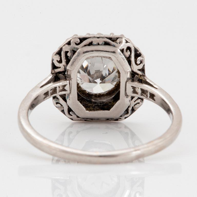 A platinum ring set with an old-cut diamond ca 1.20 cts quality ca G/H si.