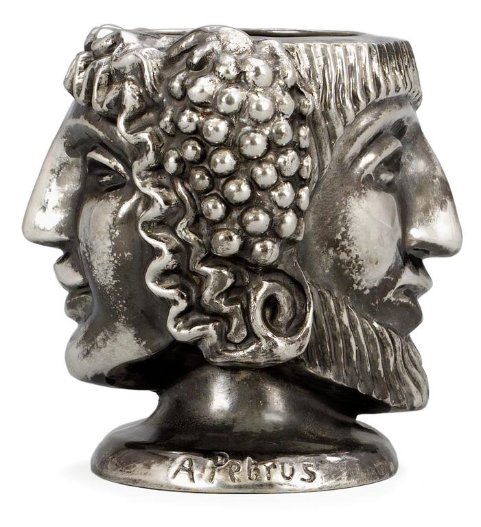 An Anna Petrus "Janus head" pewter vase, Firma Svenskt Tenn 1984.