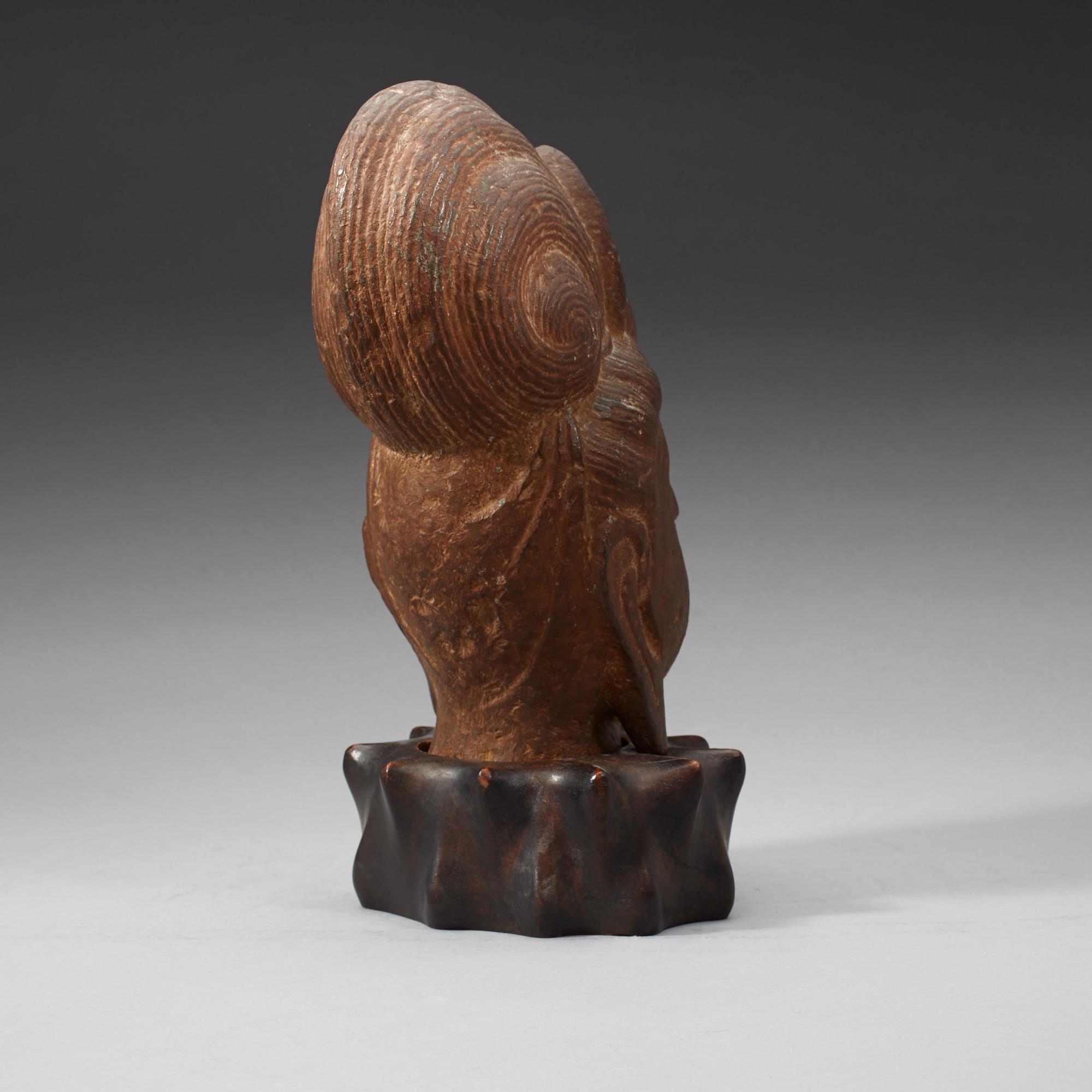 A Chinese stone head of Guanyin, possibly Tangdynasty.
