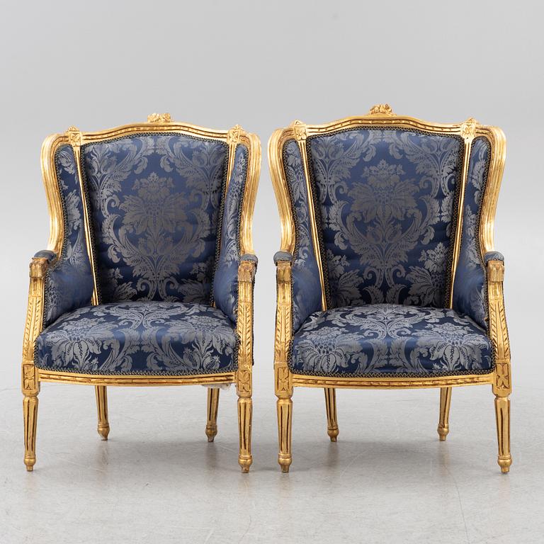 A pair of Louis XVI style armchairs, late 20th Century.