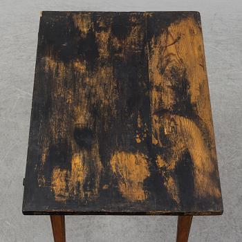 A painted Gustavian table, first half of the 19th Century.