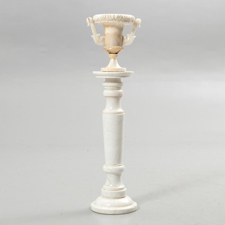 Pedestal with urn, 20th century.