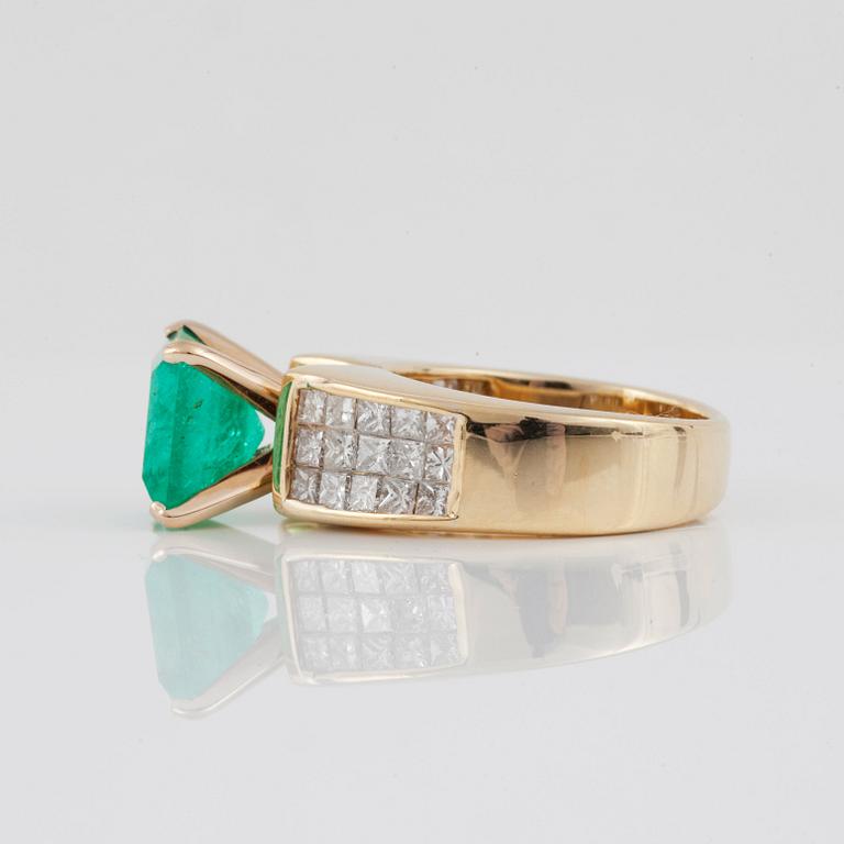 An emerald, circa 3.5 cts, and diamond, circa 1.95 cts, ring.