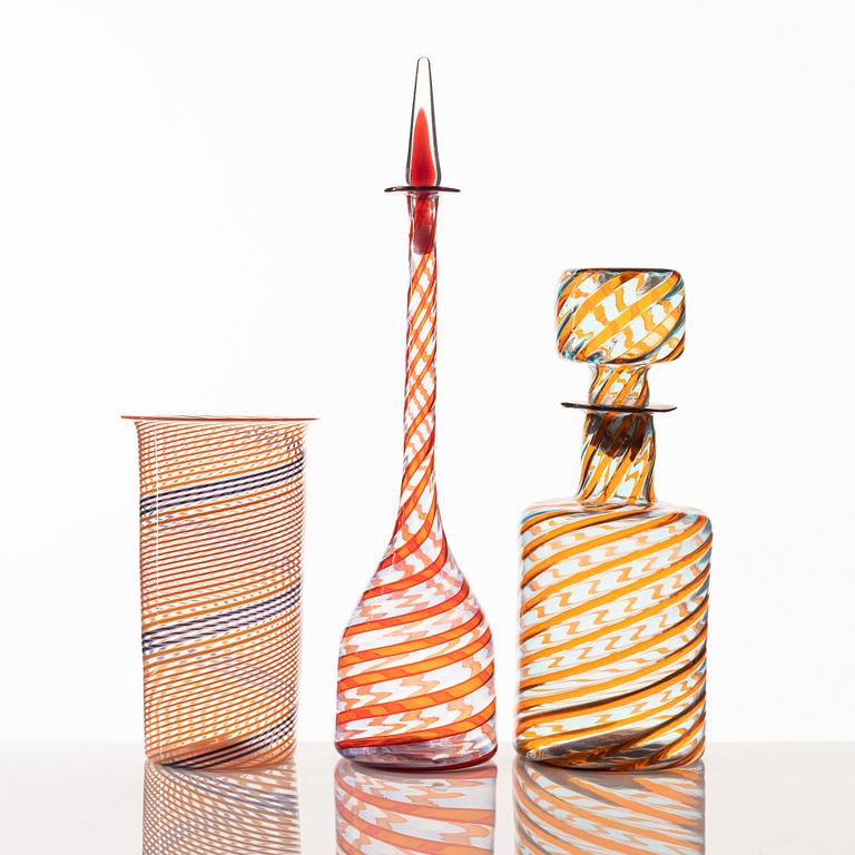 A glass vase and two glass bottles, presumably Murano, Italy.