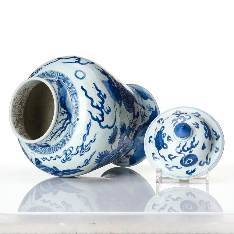 A Transtional blue and white baluster jar with cover, 17th Century.