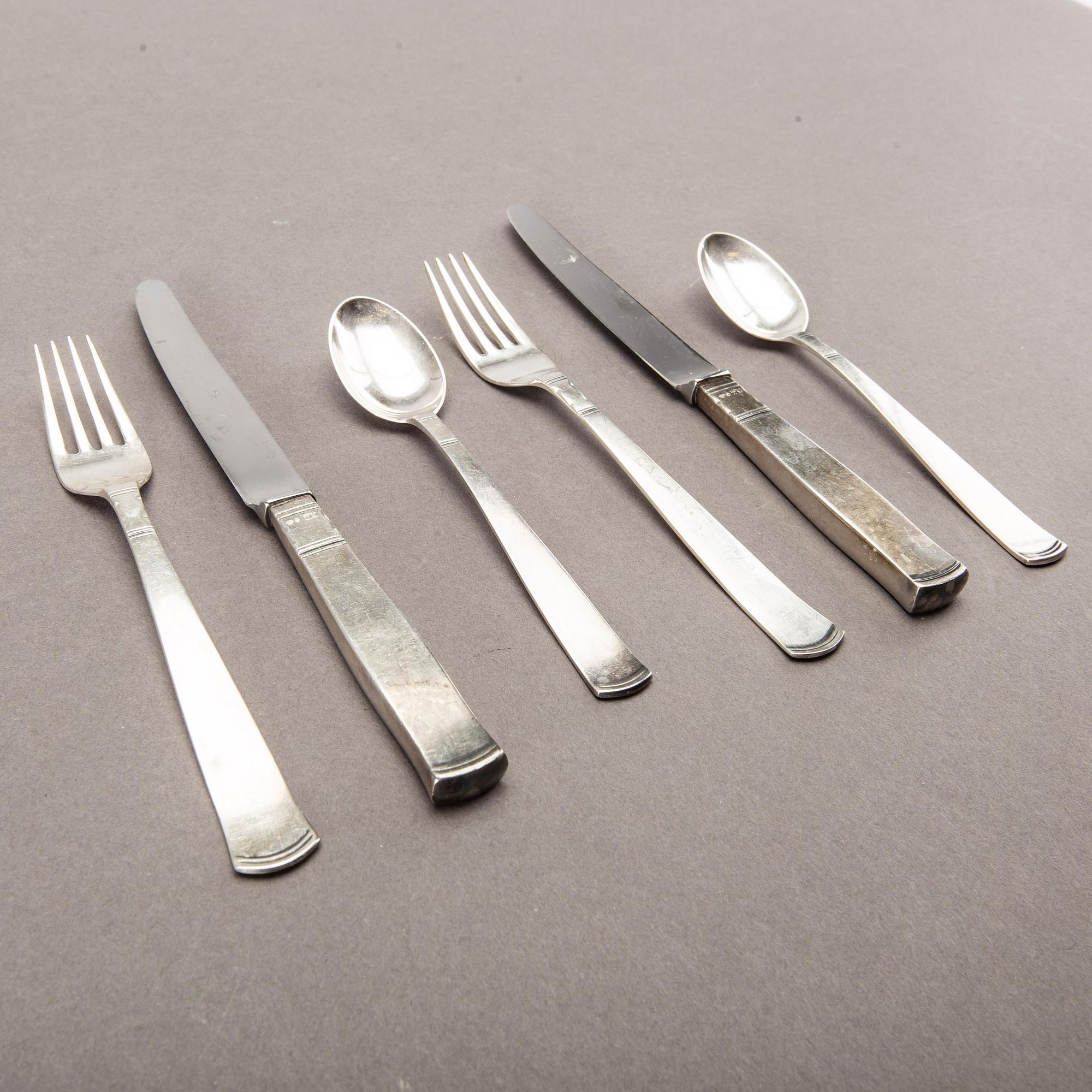 A Swedish 20th set of 36 pcs silver cutlery mark of J Ängman GAB Stockholm 1690/70s, weight ca 980 gr.