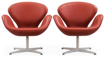 An Arne Jacobsen red leather 'Swan' chair, Fritz Hansen, Denmark 2001.