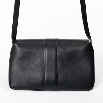 Gucci, a handbag.