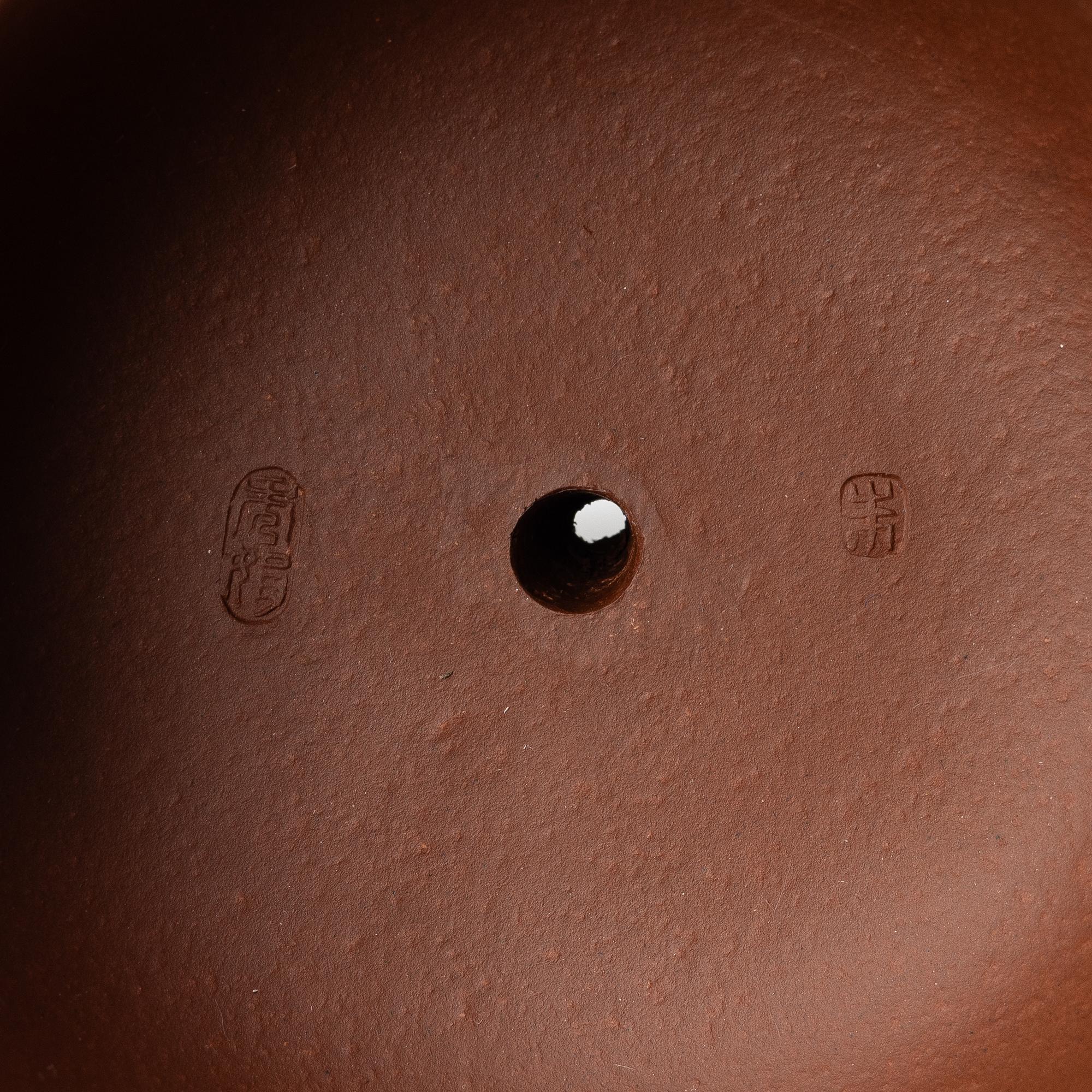 A 'calligraphy' yixing teapot, China, later part of the 1900s.