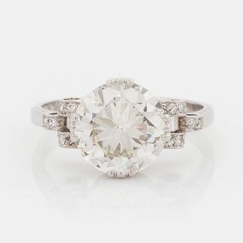 A platinum ring set with an old-cut diamond weight ca 3.00 cts quality ca J/K vs.