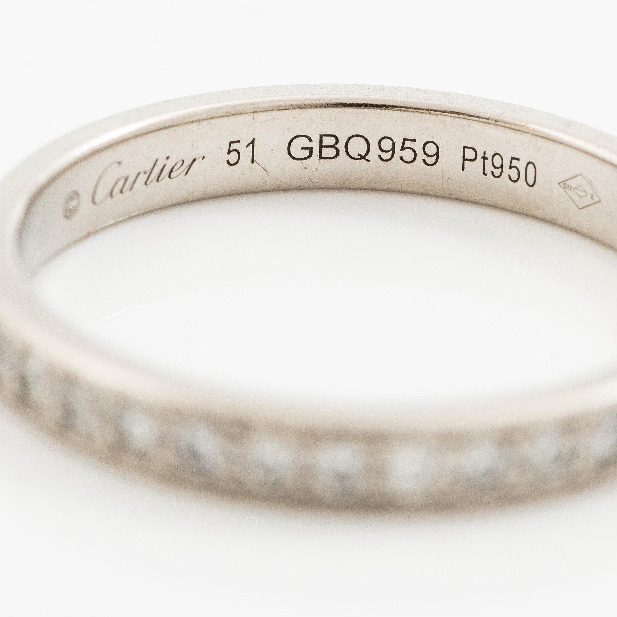 Cartier two rings platinum with round brilliant-cut diamonds.