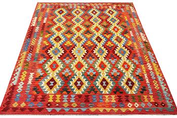 A Kelim carpet, c. 291 x 196 cm.