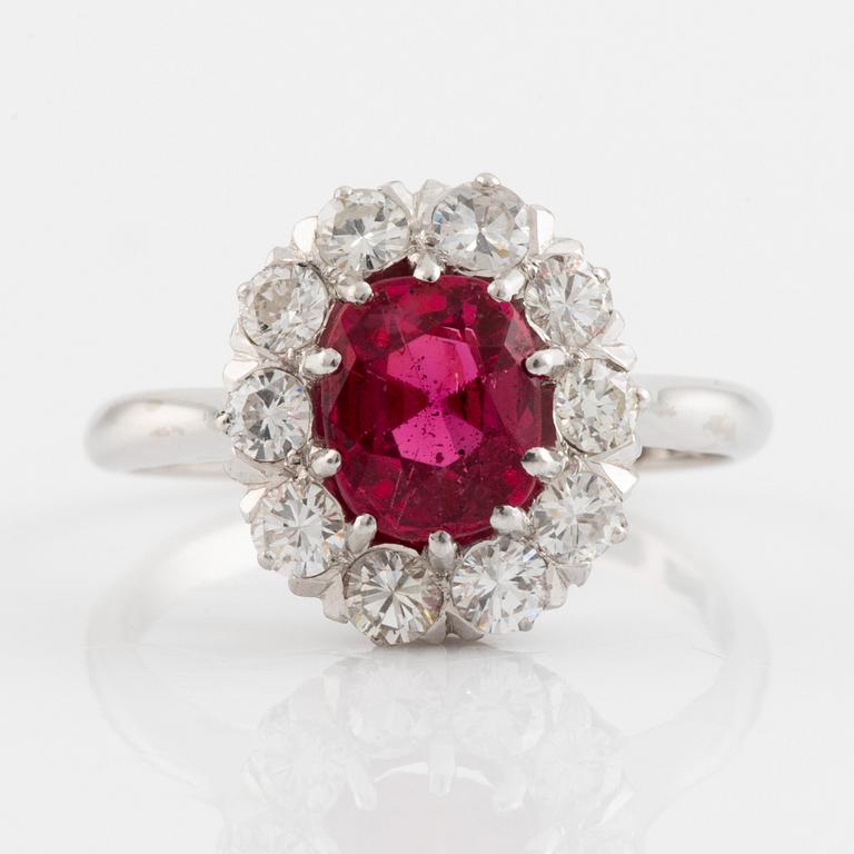 Pink spinel and brilliant cut diamond cluster ring.