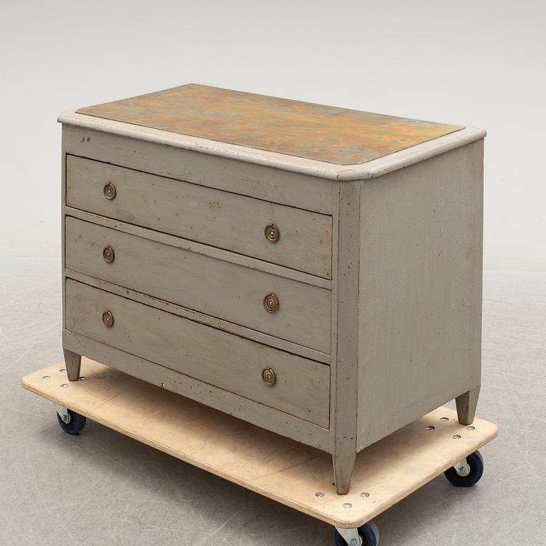 A first half of the 19th century painted chest of drawers.