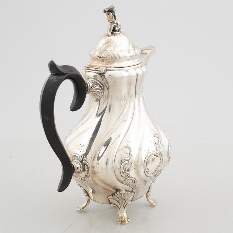 A 3-piece Rococo style silver coffee service, mark of GAB, Stockholm 1951-1954.