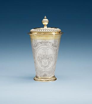 875. A Baltic parcel-gilt beaker and cover, makers mark of Christopher Dey, Riga (1729-1748(1759)).