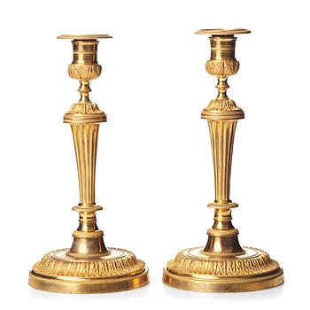 107. A pair of French Directoire candlesticks, ca 1790.