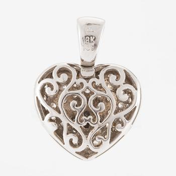 Pendant in the shape of a heart, 18K gold with round brilliant-cut diamonds.