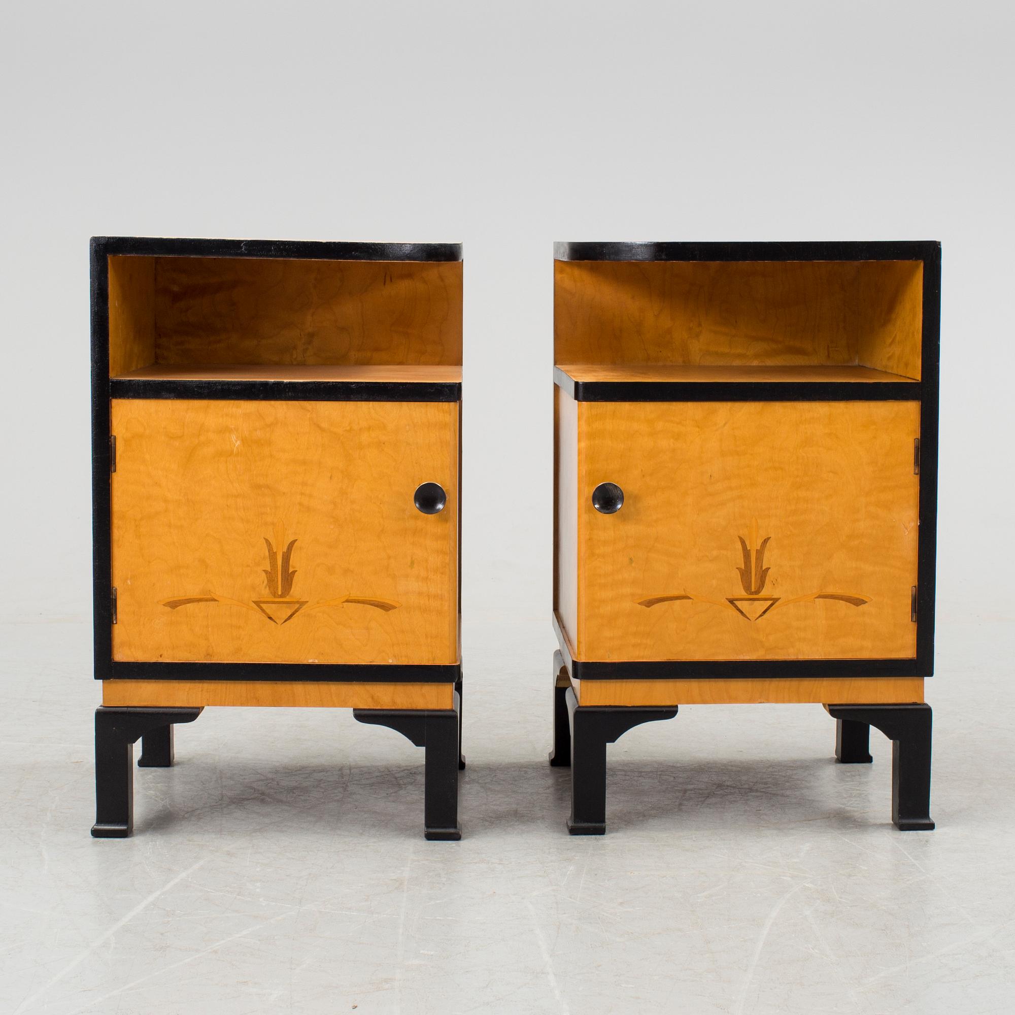 A pair of art déco bedside tables.