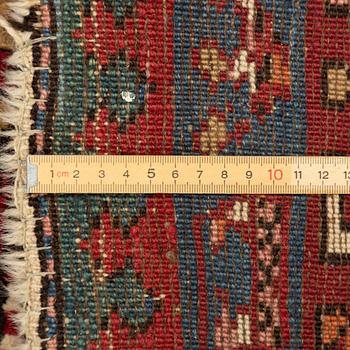 An antique Northwest Persian runner, c. 257 x 99 cm.