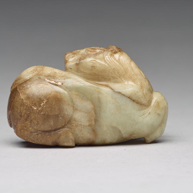 A carved nephrite figure, Ming dynasty (1368-1644).