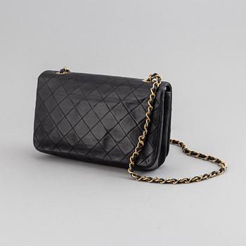 Chanel, a quilted leather 'Flap' bag, 1989-91.