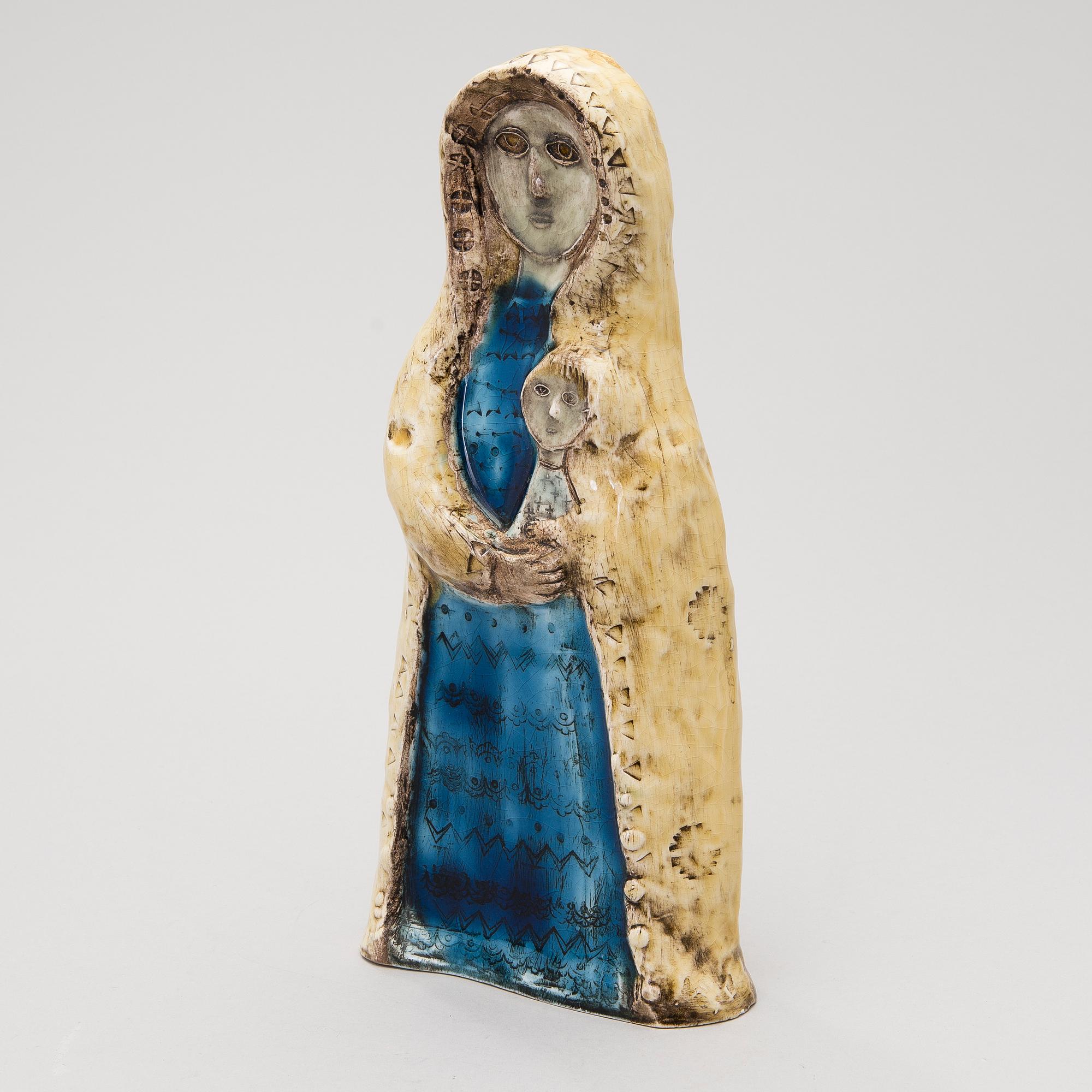 A stoneware figurine signed BRYK.