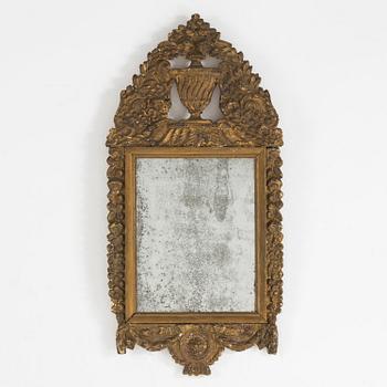 AN 18TH CENTURY MIRROR, probably French.