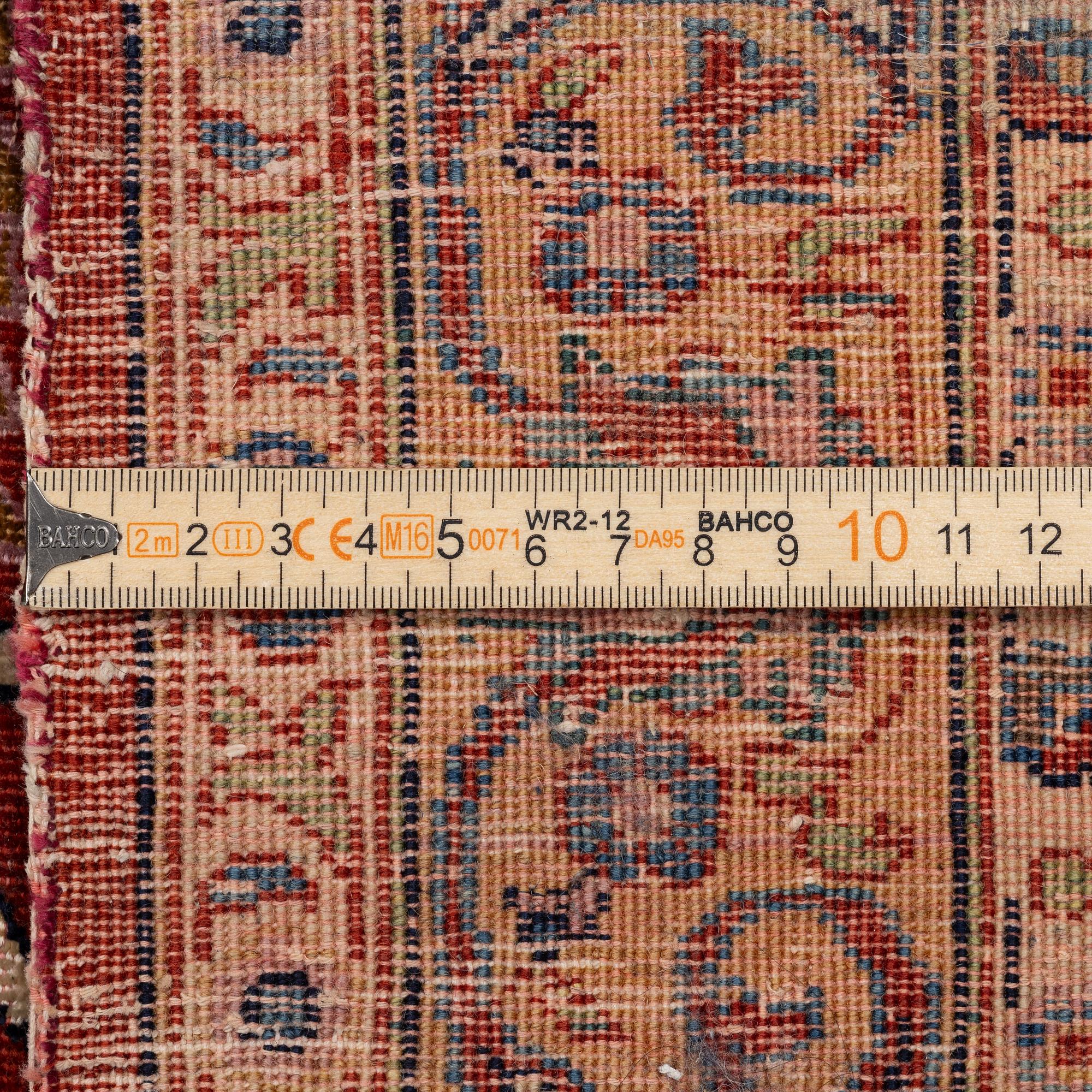 An antique central Persian carpet, c. 307 x 233 cm,