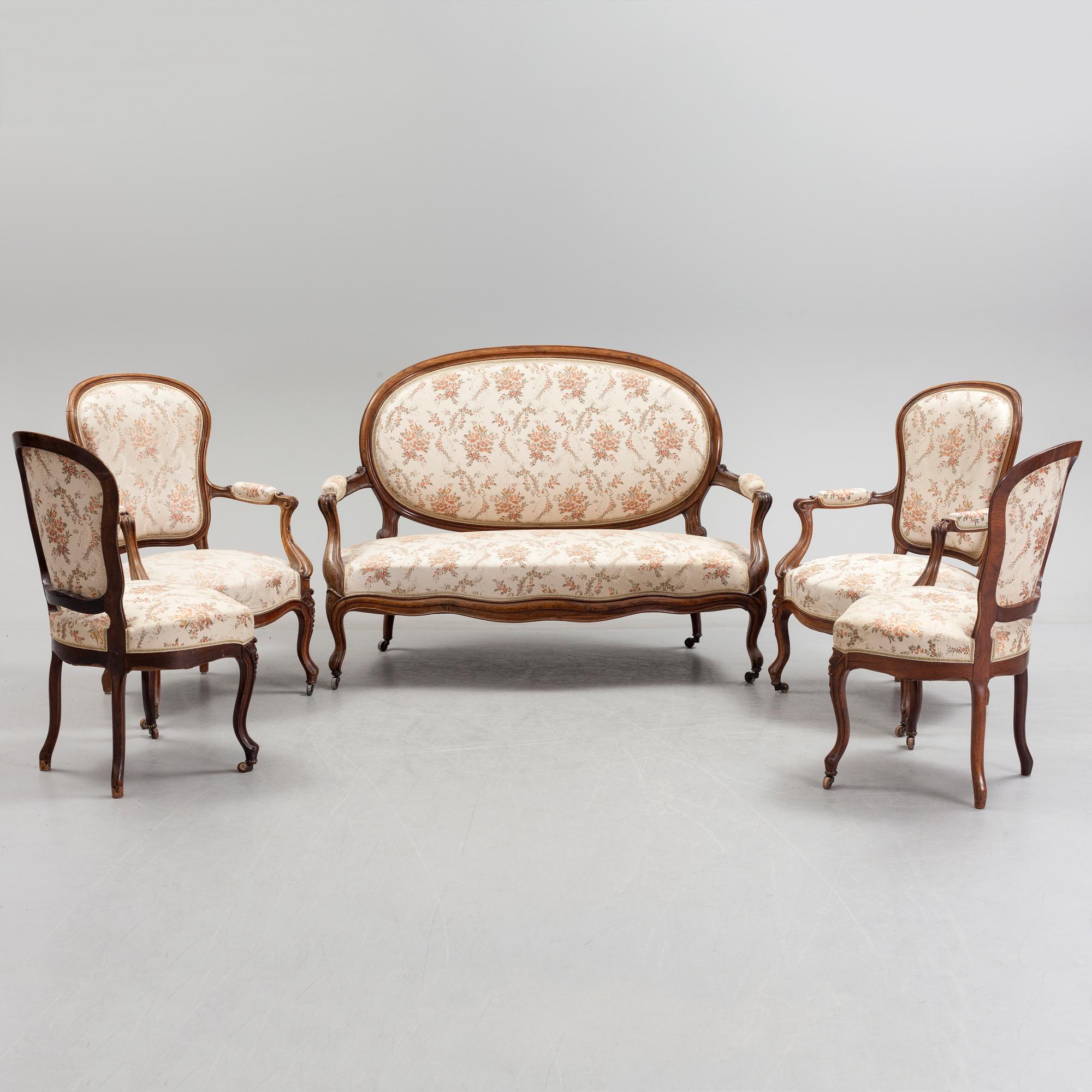 A sofa, two armchairs and two chairs, rococo style, first half of the 20th century.