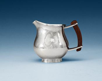 676. An Einar Telander sterling pitcher, Stockholm 1975.