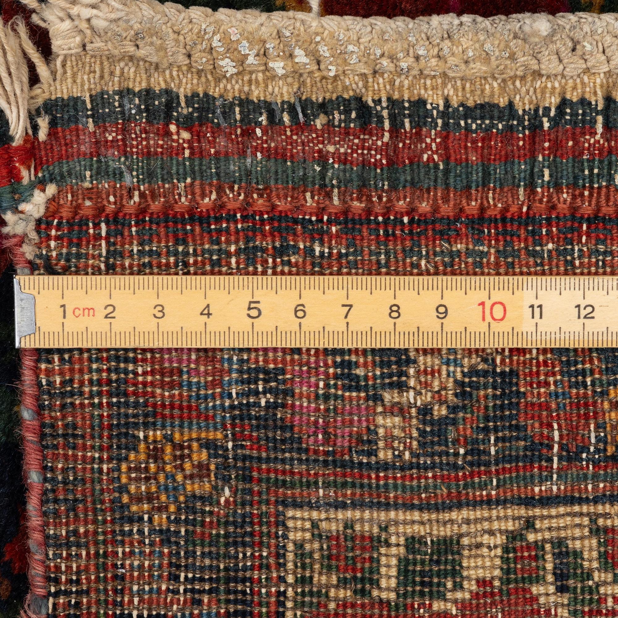 An antique Bidjar carpet, West Persia, c. 191 x 143 cm.