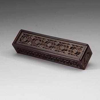 A black lacquer and gold fan in a silk clad box, Qing dynasty, 19th Century.