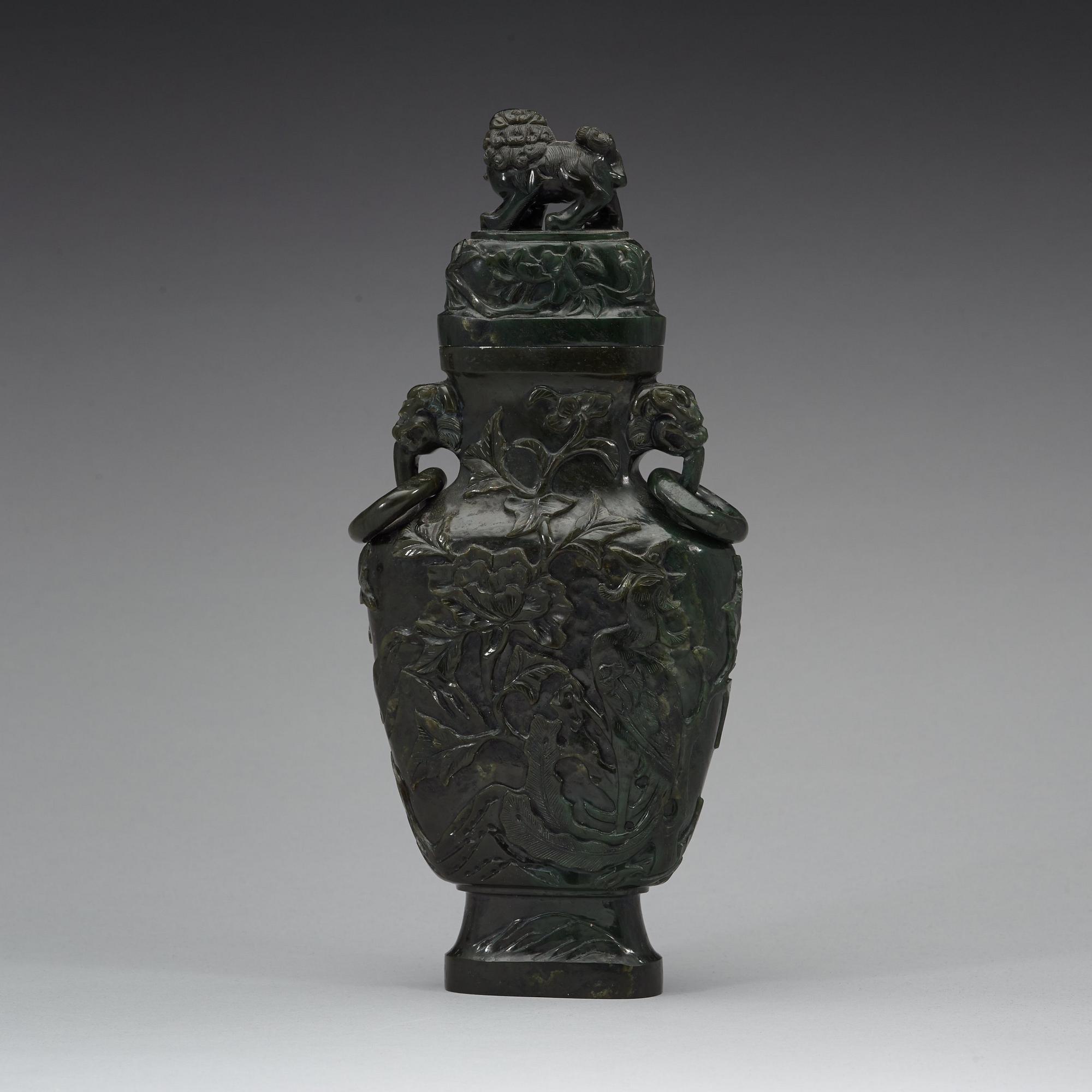 A Chinese carved stone vase, 20th Century.