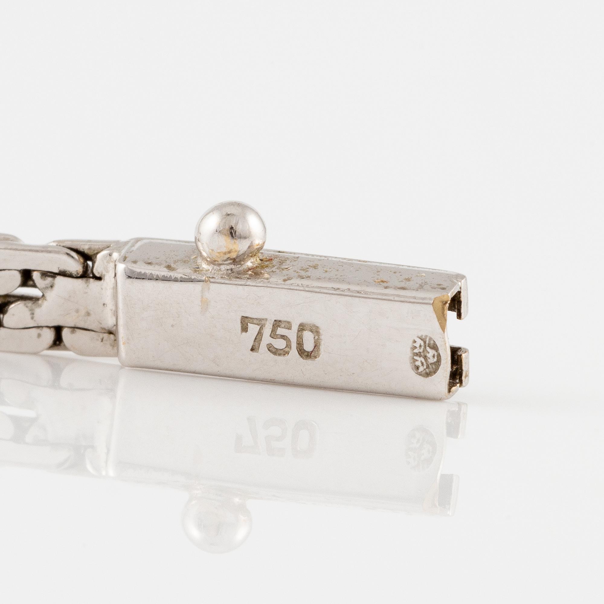 Arm bracelet, 18K white gold with small octagon-cut diamonds and sapphires.