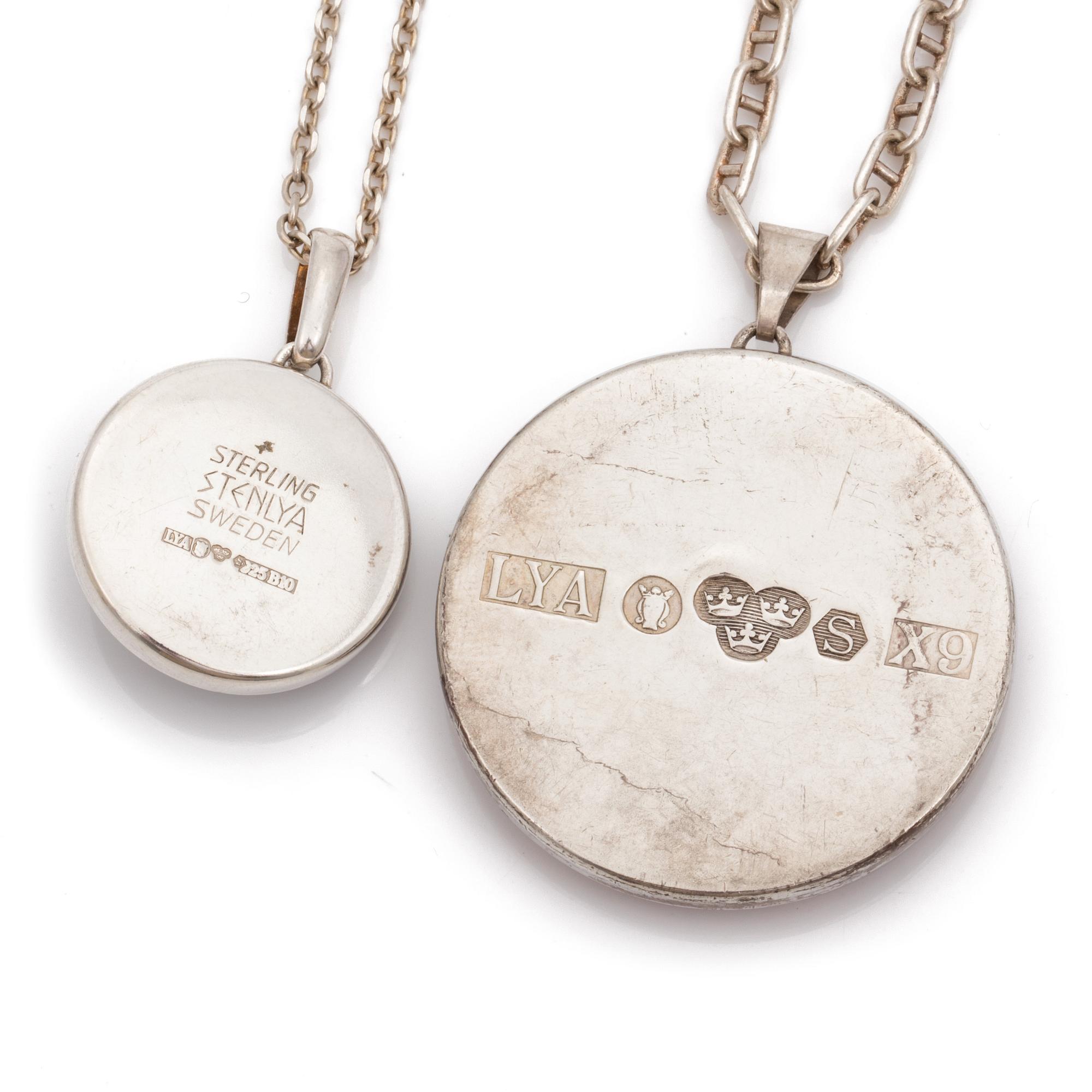 Two silver chains and pendants set with porfyry and jasper.
