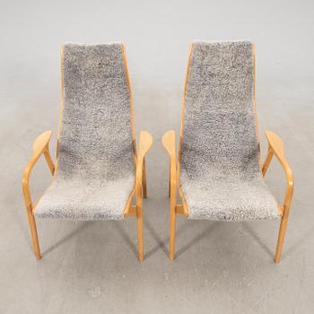 Yngve Ekström, a pair of "Lamino" armchairs for Swedese, late 20th century.