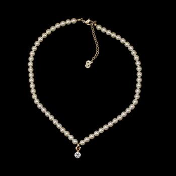 1412. A necklace with decorative pearls by Christian Dior.