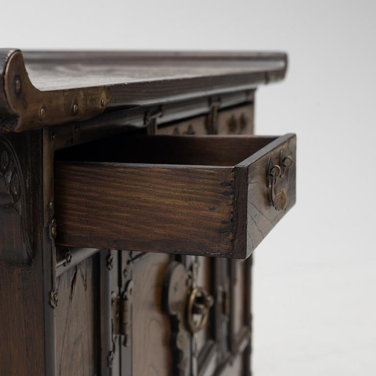 A Chinese hardwood cabinet, early 20th century.