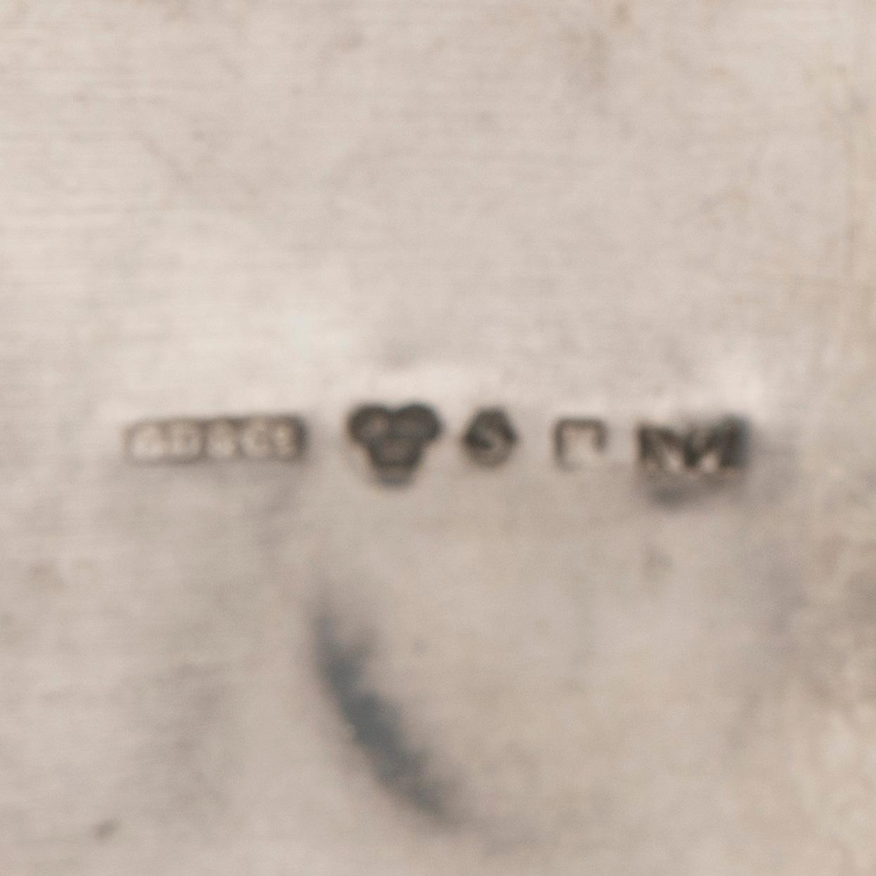 Brooch, silver with stones.