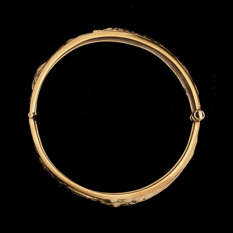 ARMRING, stel, 18k guld. Vikt ca 41 g.