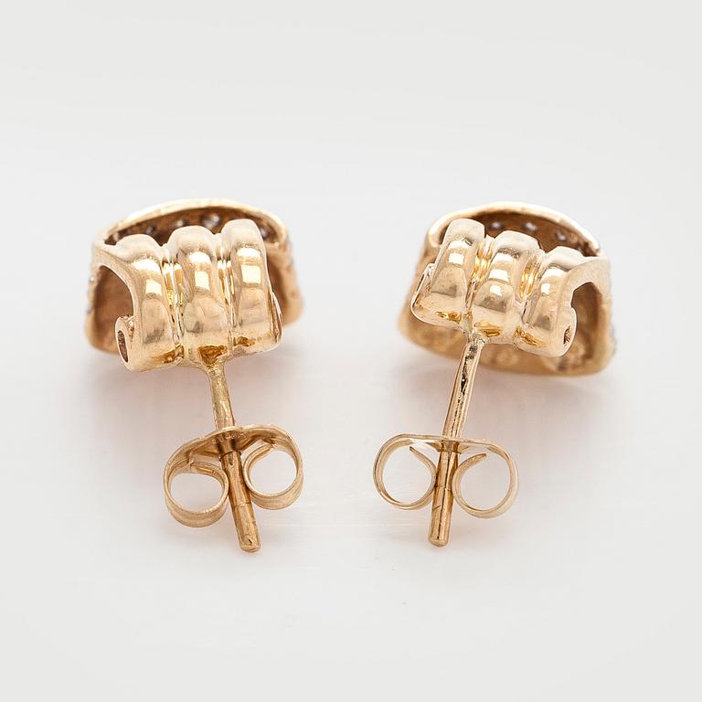 Korvakorut, 14K kultaa ja timantteja.