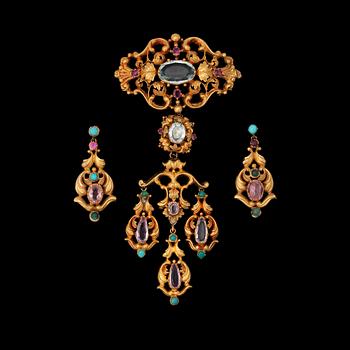 74. A brooch and a pair of earrings, 19th century.