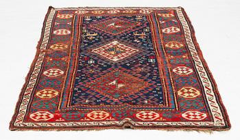 A antique Kazak gallery vcarpet, ca 240 x 120 cm.