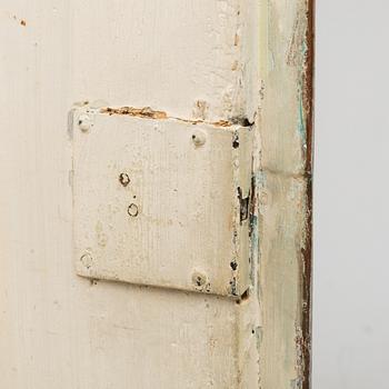 A first half of the 19th century painted corner cabinet.