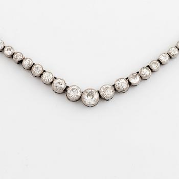 An 18K white gold and old-cut diamond rivière necklace.
